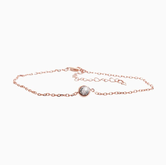 Stříbrný růžově pozlacený náramek zdobený jedním krystalem Swarovski Elements