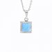 Strieborný náhrdelník so svetlo modrým opálom a kryštálmi Swarovski Elements štvorec Blue Opal