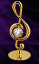 Kovová pozlacená figurka Houslový klíč s bílými krystaly Swarovski Elements