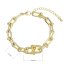 Zlatý bižuterní náramek se zirkony 53004.1