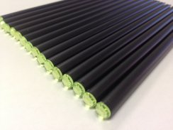 Černá tužka se zeleným krystalem