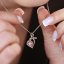 Strieborný náhrdelník so Swarovski kryštálmi srdce ružové 32071.3 Light Rose