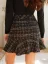 Elegantní kostkovaná tvídová sukně s knoflíky Černobílá