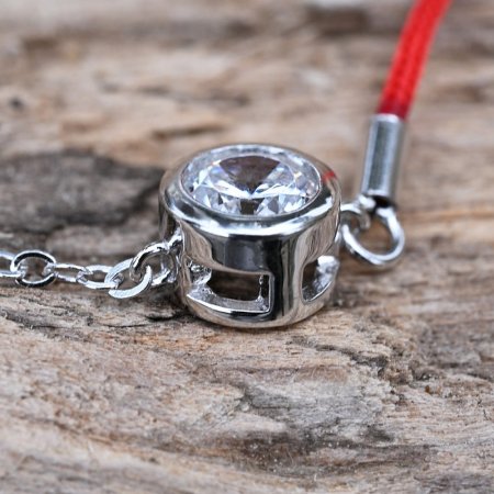 Náramek proti uhranutí stříbrný kulatý krystaly 13004.3 Red