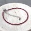 Náramek s pravými garnet kameny 43055.3 ocel