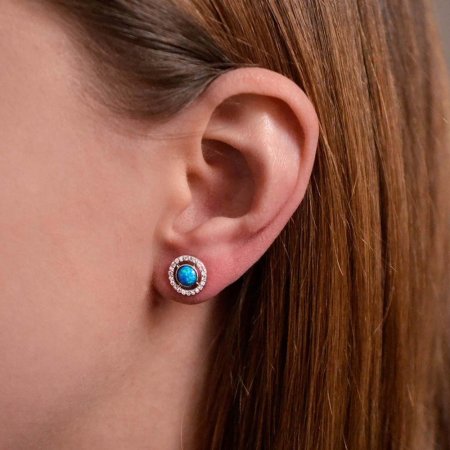 Strieborné náušnice kôstky s modrým okrúhlym syntetickým opálom a zirkónmi 11468.3 blue